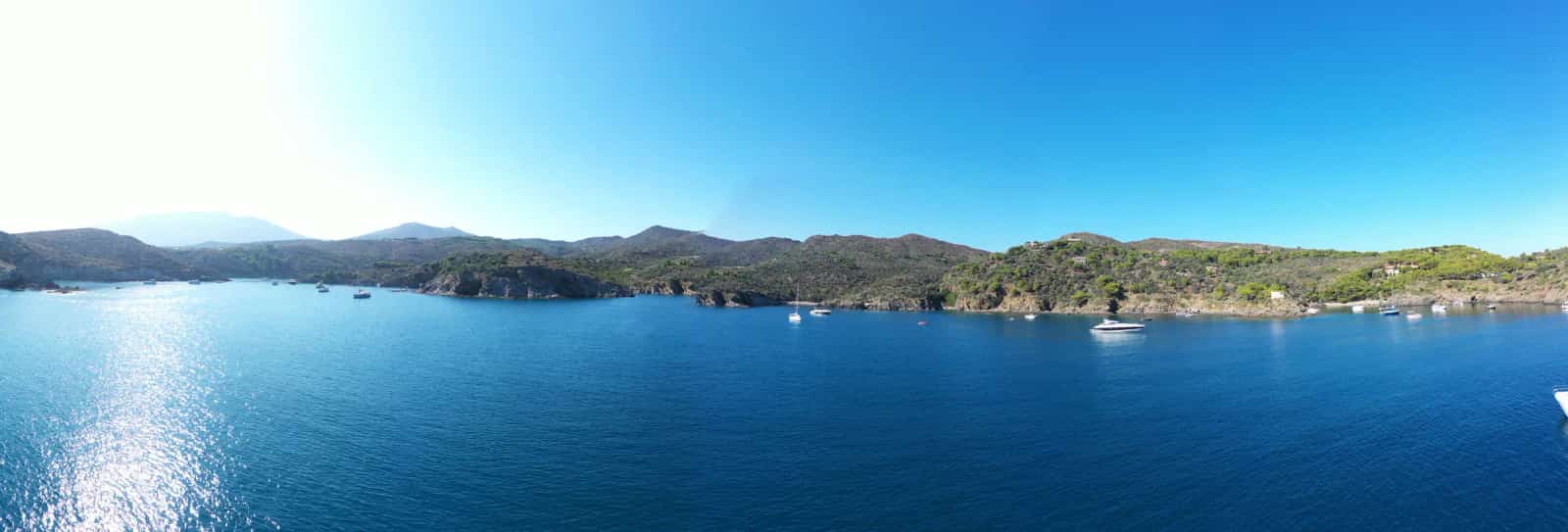 Panoramic view of a Cap de Creus cove with anchored boats, Costa Brava